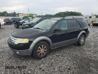 2008 Ford Taurus X SEL with VIN 1FMDK02W18GA40079, listed as a Copart auction lot 61216795 with 112,740 mi miles and Salvage title. Bid and sale history available at DreamBid. Image 1.