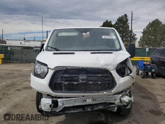 2017 Ford Transit with VIN 1FTYR1ZM7HKB14498, listed as a Copart auction lot 50426995 with 113,262 mi miles and Salvage Title. Bid and sale history available at DreamBid. Image 5.