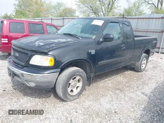 2003 Ford F-150 XL with VIN 2FTRX18W73CA80587, listed as a IAAI auction lot 42119924 with 222,990 mi miles. Bid and sale history available at carsss.com. Image 2.