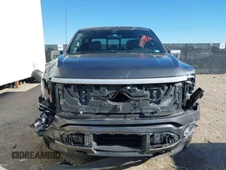 2023 Ford F-150 Lightning Pro with VIN 1FTVW1EL8PWG06781, listed as a IAAI auction lot 41861926 with 27,051 mi miles. Bid and sale history available at carsss.com. Image 13.