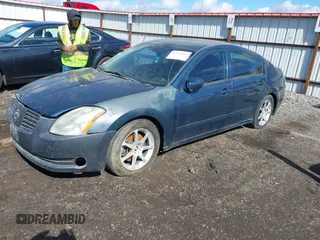 2004 Nissan Maxima SL with VIN 1N4BA41E44C847427, listed as a IAAI auction lot 42229366 with 156,728 mi miles and . Bid and sale history available at DreamBid. Image 2.