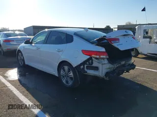 2017 Kia Optima EX with VIN KNAGU4LE8H5017318, listed as a IAAI auction lot 41885802 with 104,797 mi miles and . Bid and sale history available at DreamBid. Image 3.