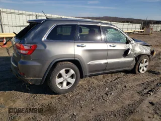 2013 Jeep Grand Cherokee Overland with VIN 1C4RJFCG0DC607214, listed as a Copart auction lot 43672575 with 188,026 mi miles and Salvage Title. Bid and sale history available at carsss.com. Image 3.