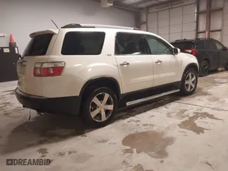 2011 GMC Acadia SLT1 with VIN 1GKKRRED7BJ265501, listed as a IAAI auction lot 41561336 with 152,916 mi miles. Bid and sale history available at carsss.com. Image 4.