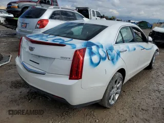 2016 Cadillac ATS Standard AWD z VIN 1G6AG5RX1G0157420, wystawiony jako Copart lot #70697003 z przebiegiem Nie podano mil oraz Szkoda całkowita • Salvage title. Historia ofert i sprzedaży dostępna na DreamBid. Obrazek 3.