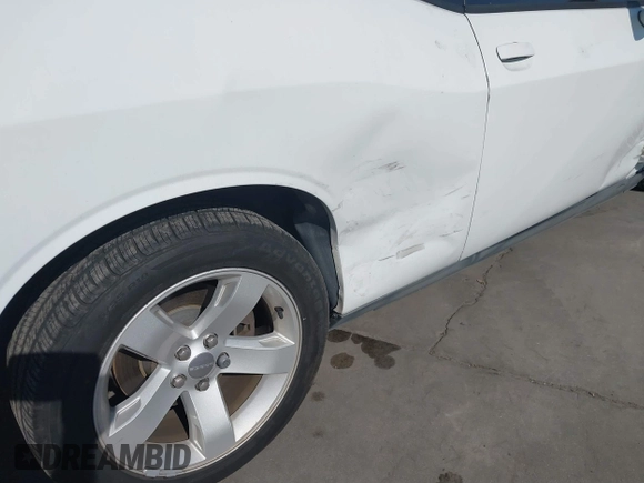 2013 Dodge Challenger SXT z VIN 2C3CDYAG8DH569468, wystawiony jako IAAI lot #41792206 z przebiegiem 161 439 mil mil oraz . Historia ofert i sprzedaży dostępna na DreamBid. Obrazek 19.