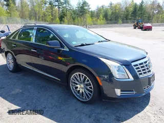 2013 Cadillac XTS Platinum z VIN 2G61V5S35D9221098, wystawiony jako IAAI lot #42242800 z przebiegiem 177 023 mil mil oraz . Historia ofert i sprzedaży dostępna na DreamBid. Obrazek 1.