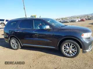 2015 Dodge Durango Citadel с VIN 1C4RDHEGXFC907426, выставлен на аукционе IAAI как лот 41510971 с пробегом 100 145 миль миль и . История ставок и продаж доступна на DreamBid. Изображение 13.