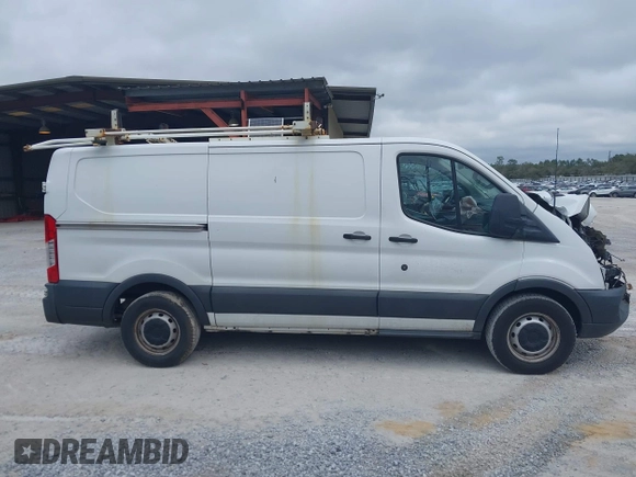 2016 Ford Transit Cargo z VIN 1FTYE1YMXGKB48964, wystawiony jako IAAI lot #41227860 z przebiegiem Nie podano mil oraz . Historia ofert i sprzedaży dostępna na DreamBid. Obrazek 14.