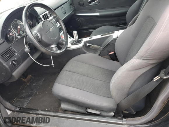 2005 Chrysler Crossfire z VIN 1C3AN59L75X033290, wystawiony jako Copart lot #83530624 z przebiegiem Nie podano mil oraz Czysty tytuł • Clean title. Historia ofert i sprzedaży dostępna na DreamBid. Obrazek 7.