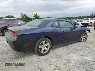 2013 Dodge Challenger SXT z VIN 2C3CDYAG8DH609306, wystawiony jako Copart lot #55772985 z przebiegiem 179 231 mil mil oraz Szkody całkowita. Historia ofert i sprzedaży dostępna na DreamBid. Obrazek 3.