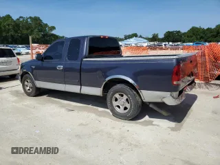 2001 Ford F-150 XL with VIN 1FTRX17W81NA24523, listed as a Copart auction lot 60287715 with Not provided miles and Salvage title. Bid and sale history available at DreamBid. Image 2.