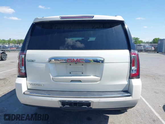 2015 GMC Yukon Denali with VIN 1GKS1CKJ3FR230797, listed as a IAAI auction lot 41977294 with 174,633 mi miles. Bid and sale history available at carsss.com. Image 6.