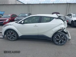 2019 Toyota C-HR XLE z VIN JTNKHMBX3K1029701, wystawiony jako IAAI lot #42023964 z przebiegiem 83 055 mil mil oraz . Historia ofert i sprzedaży dostępna na DreamBid. Obrazek 14.