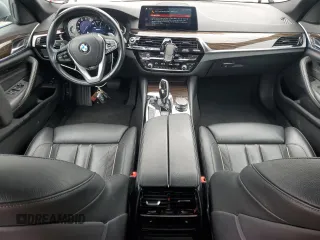 2019 BMW 5 Series 530e xDrive with VIN WBAJB1C56KB375312, listed as a Copart auction lot 52709125 with 63,422 mi miles and Salvage title. Bid and sale history available at DreamBid. Image 8.
