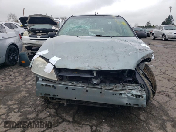 2005 Ford Focus S with VIN 1FAFP34N75W290051, listed as a Copart auction lot 48337245 with 0 mi miles and Salvage Title. Bid and sale history available at carsss.com. Image 5.