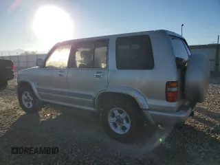 1999 Isuzu Trooper S с VIN JACDJ58X1X7931474, выставлен на аукционе Copart как лот 80273494 с пробегом 295 128 миль миль и Чистый • Clean title. История ставок и продаж доступна на DreamBid. Изображение 2.