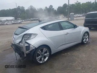 2012 Hyundai Veloster w/Black Int with VIN KMHTC6AD1CU034787, listed as a IAAI auction lot 42607847 with 126,912 mi miles and . Bid and sale history available at DreamBid. Image 4.