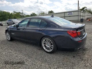 2015 BMW 7 Series 750i xDrive with VIN WBAYB6C58FD966084, listed as a Copart auction lot 61875325 with 159,616 mi miles and Salvage title. Bid and sale history available at DreamBid. Image 2.