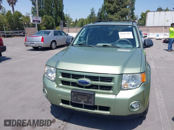 2009 Ford Escape Hybrid z VIN 1FMCU49329KA08605, wystawiony jako IAAI lot #42367265 z przebiegiem 166 562 mil mil oraz . Historia ofert i sprzedaży dostępna na DreamBid. Obrazek 6.