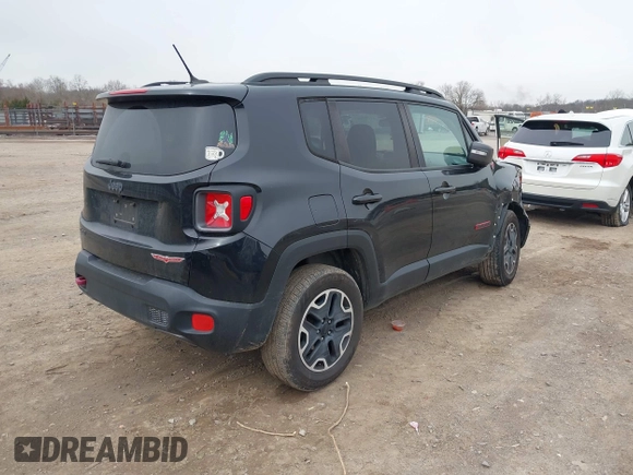 2017 Jeep Renegade Trailhawk z VIN ZACCJBCB9HPG55038, wystawiony jako IAAI lot #41737043 z przebiegiem 103 488 mil mil oraz . Historia ofert i sprzedaży dostępna na DreamBid. Obrazek 4.