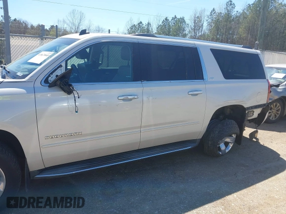 2015 Chevrolet Suburban LTZ with VIN 1GNSCKKC3FR113388, listed as a IAAI auction lot 41867964 with 238,530 mi miles and . Bid and sale history available at DreamBid. Image 6.