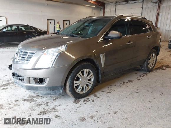 2015 Cadillac SRX Luxury Collection with VIN 3GYFNBE34FS575613, listed as a IAAI auction lot 41697251 with 173,117 mi miles and . Bid and sale history available at DreamBid. Image 17.
