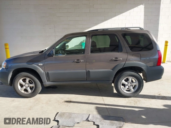 2006 Mazda Tribute i with VIN 4F2YZ02Z26KM12180, listed as a IAAI auction lot 41959606 with 228,217 mi miles and . Bid and sale history available at DreamBid. Image 14.