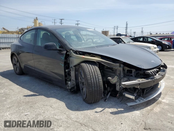 2023 Tesla Model 3 z VIN 5YJ3E1EA7PF549051, wystawiony jako Copart lot #58932765 z przebiegiem 8 800 mil mil oraz Szkoda całkowita • Salvage title. Historia ofert i sprzedaży dostępna na DreamBid. Obrazek 4.