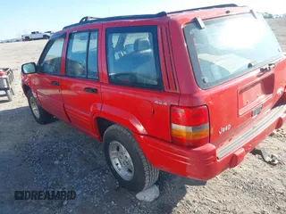 1998 Jeep Grand Cherokee Laredo with VIN 1J4GZ48Y6WC290798, listed as a IAAI auction lot 41816161 with 299,875 mi miles. Bid and sale history available at carsss.com. Image 3.