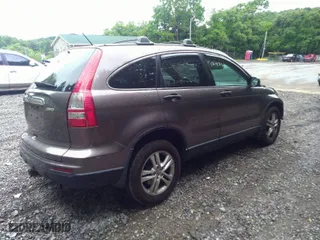 2010 Honda CR-V EX with VIN 3CZRE4H54AG702300, listed as a IAAI auction lot 38155711 with 145,688 mi miles. Bid and sale history available at carsss.com. Image 4.