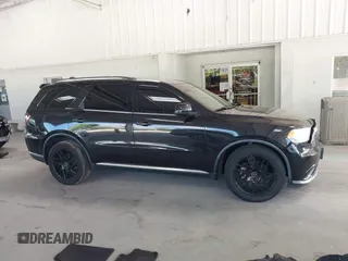 2016 Dodge Durango SXT with VIN 1C4RDHAG3GC301666, listed as a IAAI auction lot 42264091 with 100,769 mi miles and . Bid and sale history available at DreamBid. Image 14.