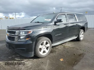 2015 Chevrolet Suburban LT with VIN 1GNSKJKC4FR202349, listed as a Copart auction lot 79274044 with 222,792 mi miles and Salvage Title. Bid and sale history available at carsss.com. Image 1.