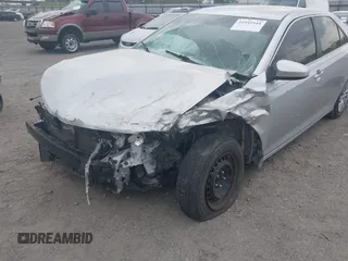 2014 Toyota Camry L with VIN 4T1BF1FK6EU346670, listed as a IAAI auction lot 41942544 with 140,438 mi miles and . Bid and sale history available at DreamBid. Image 6.