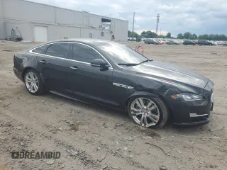 2019 Jaguar XJ R-Sport with VIN SAJWA1C7XK8W21242, listed as a Copart auction lot 56092225 with 47,727 mi miles and Salvage title. Bid and sale history available at DreamBid. Image 4.