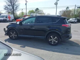 2018 Toyota RAV4 XLE with VIN 2T3RFREV6JW734993, listed as a IAAI auction lot 41790232 with 61,118 mi miles. Bid and sale history available at carsss.com. Image 13.