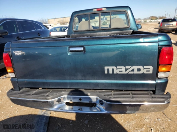 1997 Mazda B-Series 2WD Truck with VIN 4F4CR12A1VTM15033, listed as a Copart auction lot 84459434 with 143,764 mi miles and Salvage Title. Bid and sale history available at carsss.com. Image 10.