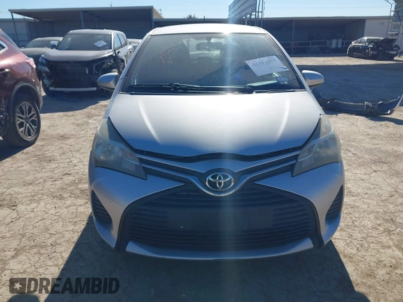 2015 Toyota Yaris L with VIN VNKJTUD38FA020465, listed as a IAAI auction lot 41416577 with 142,751 mi miles and . Bid and sale history available at DreamBid. Image 13.