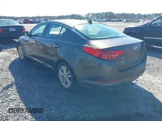 2013 Kia Optima EX with VIN 5XXGN4A74DG174838, listed as a IAAI auction lot 41621839 with 227,173 mi miles. Bid and sale history available at carsss.com. Image 3.