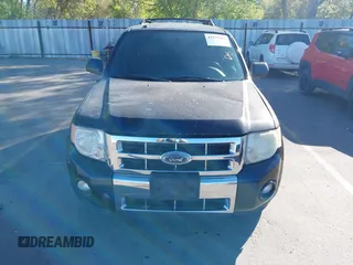 2011 Ford Escape Limited with VIN 1FMCU9EGXBKB66282, listed as a IAAI auction lot 42177063 with 244,515 mi miles. Bid and sale history available at carsss.com. Image 6.