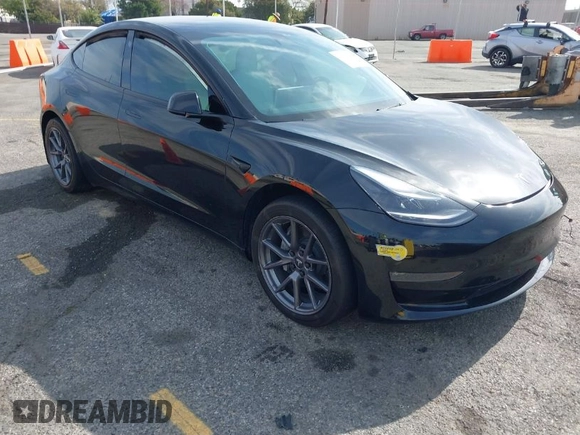 2022 Tesla Model 3 Long Range with VIN 5YJ3E1EB6NF233131, listed as a IAAI auction lot 41819409 with 38,308 mi miles and . Bid and sale history available at DreamBid. Image 1.