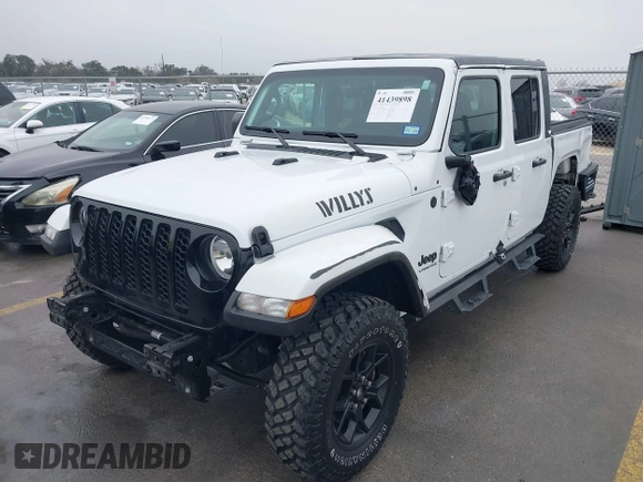2021 Jeep Gladiator Willys with VIN 1C6HJTAG1ML575474, listed as a IAAI auction lot 41439898 with 44,335 mi miles and . Bid and sale history available at DreamBid. Image 19.