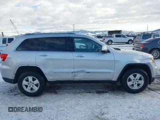 2011 Jeep Grand Cherokee Laredo with VIN 1J4RR4GG7BC584500, listed as a IAAI auction lot 41383355 with 161,722 mi miles. Bid and sale history available at carsss.com. Image 13.