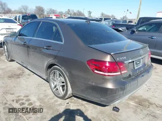 2014 Mercedes-Benz E 550 Sport with VIN WDDHF9BB5EA971894, listed as a IAAI auction lot 41405571 with 113,363 mi miles and . Bid and sale history available at DreamBid. Image 3.