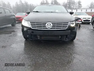 2013 Volkswagen CC Lux with VIN WVWRP7AN5DE554388, listed as a IAAI auction lot 41004116 with 162,457 mi miles. Bid and sale history available at carsss.com. Image 6.