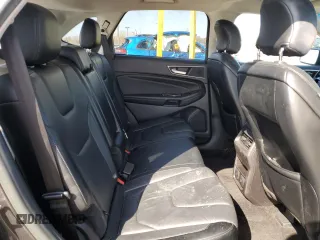 2015 Ford Edge Titanium z VIN 2FMTK4K9XFBB50825, wystawiony jako Copart lot #52034965 z przebiegiem 92 029 mil mil oraz Nie do naprawy • Non repairable. Historia ofert i sprzedaży dostępna na DreamBid. Obrazek 11.