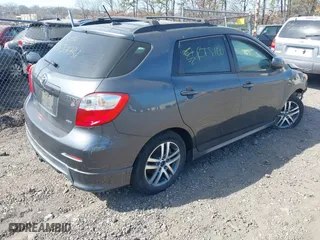 2009 Toyota Matrix S with VIN 2T1LE40E39C001020, listed as a IAAI auction lot 41801991 with 999,999 mi miles. Bid and sale history available at carsss.com. Image 4.