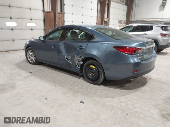 2014 Mazda 6 i Sport with VIN JM1GJ1U61E1148983, listed as a IAAI auction lot 41977553 with 100,668 mi miles and . Bid and sale history available at DreamBid. Image 3.