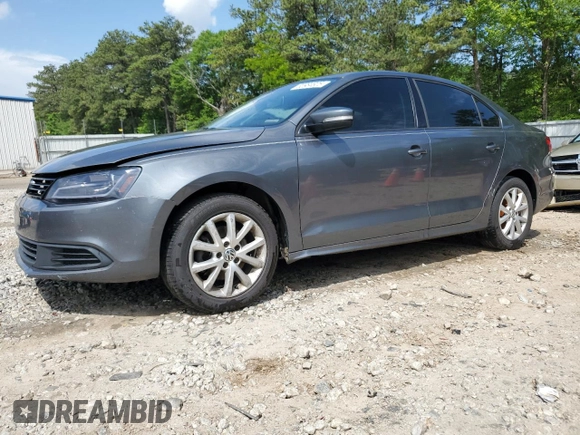 2011 Volkswagen Jetta SE with VIN 3VWDX7AJ2BM361210, listed as a Copart auction lot 53984825 with 223,915 mi miles and Salvage title. Bid and sale history available at DreamBid. Image 1.