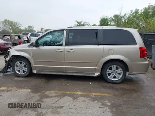 2013 Dodge Grand Caravan Crew with VIN 2C4RDGDG7DR624563, listed as a IAAI auction lot 42038157 with 265,044 mi miles and . Bid and sale history available at DreamBid. Image 14.